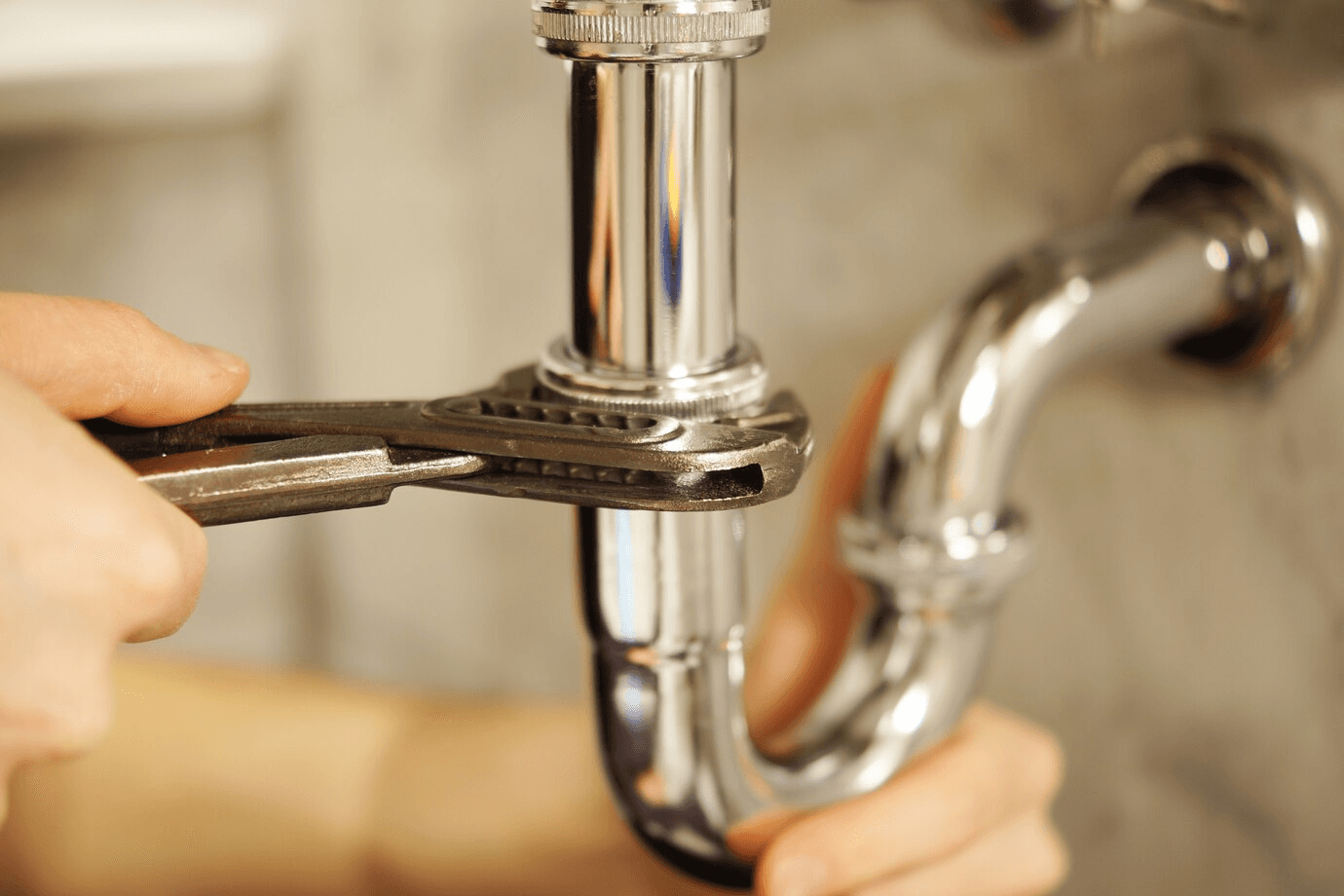 Plumber repairing pipes